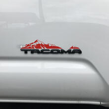 Etiqueta engomada de las montañas de Toyota Tacoma sobre la insignia
 2