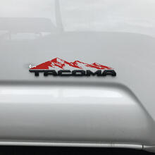 Etiqueta engomada de las montañas de Toyota Tacoma sobre la insignia Tacoma 2
 2