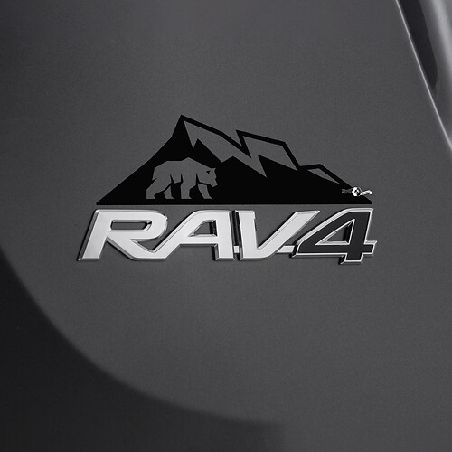 Etiqueta adhesiva de cerveza de montañas sobre la insignia trasera del Toyota Rav4
 1