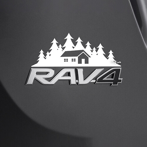 Etiqueta adhesiva de la casa de las montañas sobre la insignia trasera del Toyota Rav4
