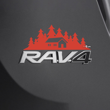 Etiqueta adhesiva de la casa de las montañas sobre la insignia trasera del Toyota Rav4
 2