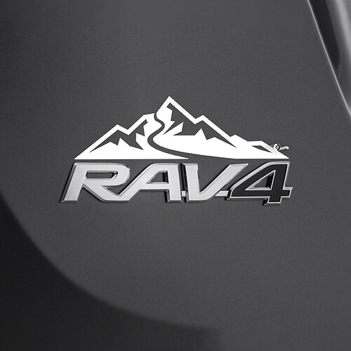 Etiqueta adhesiva de la casa de las montañas sobre la insignia trasera del Toyota Rav4
 1